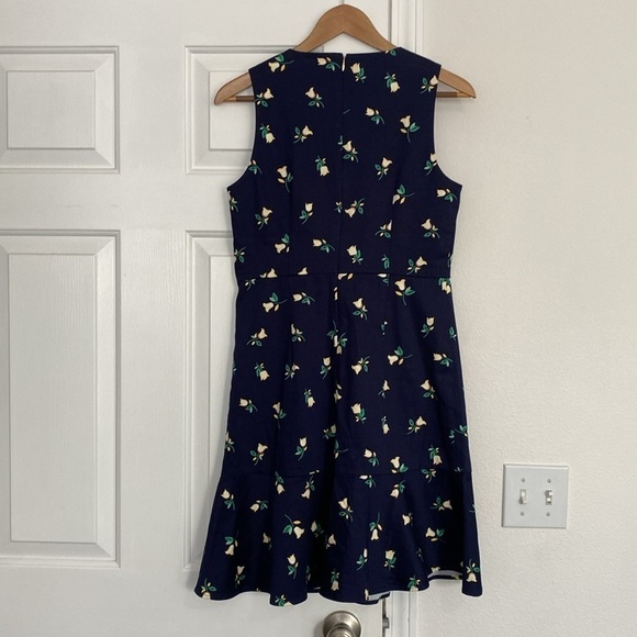 Draper James navy floral sleeveless dress with ruffled hem. - Picture 12 of 12